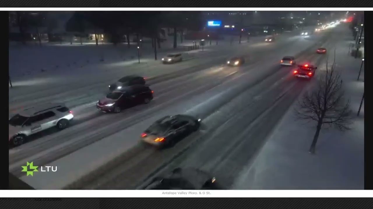 Snowy evening road conditions Antelope Valley Pkwy and O St Lincoln Nebraska 2-19-26