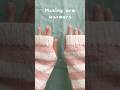 Pink and white striped knitted arm warmers