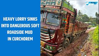 Heavy lorry sinks into dangerous soft roadside mud in Curchorem screenshot 1