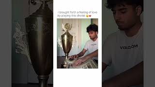 a boy with a trophy 🏆 beat 🪘 dholak