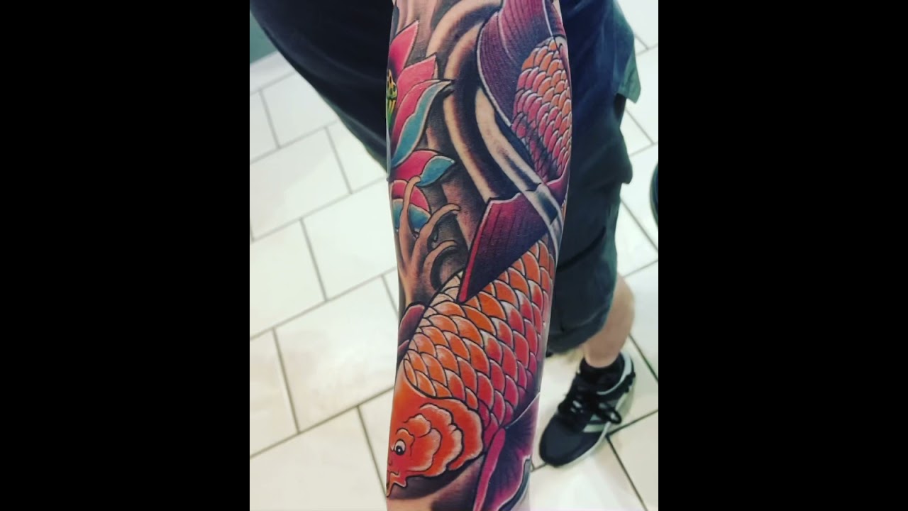 Japanese koi and lotus. Tattooed at Garth’s www.kenttattooartists.co.uk