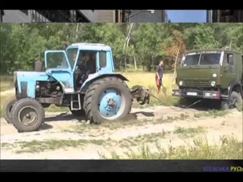 Трактор вытягивает камаз