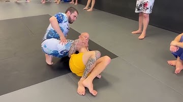 Jeff Glover explains low grip and high grip for deep half guard