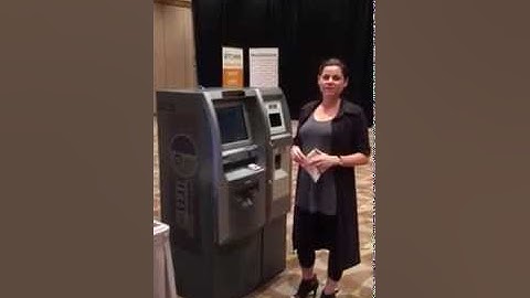 BA Carmen Potgieter buying Bitcoin from Bitcoin ATM during Inside Bitcoin Hong Kong 2015