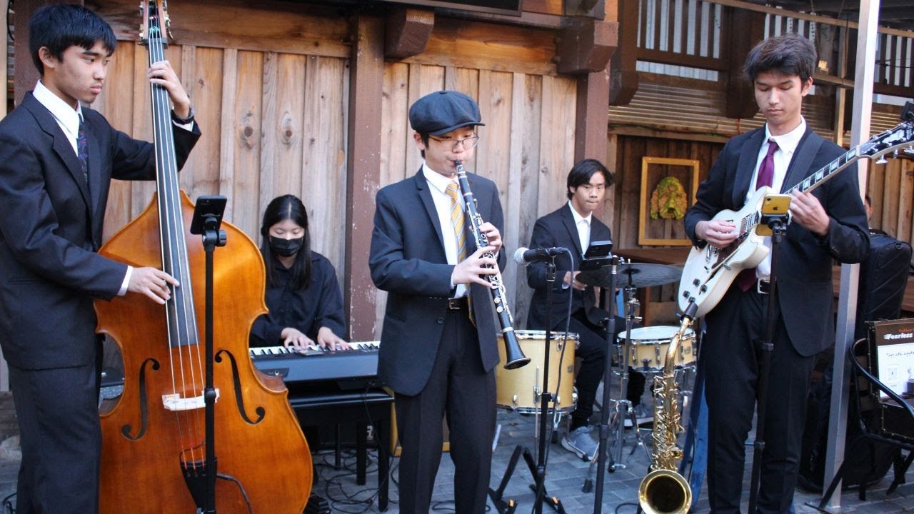 High school jazz band connects communities for a greater good - YouTube