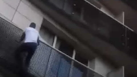 Real-Life Spider-Man Scrambles Up Building To Save A Dangling Child