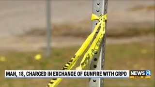 Man, 18, charged in exchange of gunfire with GRPD