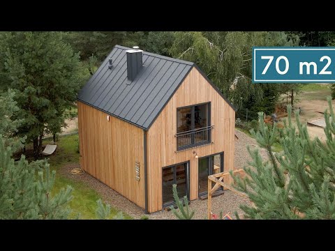 Wideo: Ciekawy projekt drewnianych domów w środku