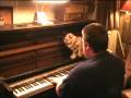Cute cat investigates pianos inner action as organist1982 plays honkytonk style