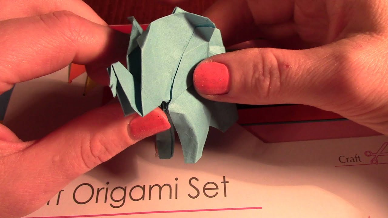 ASMR showing origami craft *soft whisper* plastic crinkling, paper