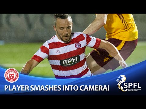 Accies star smashes into camera and comes off worst!