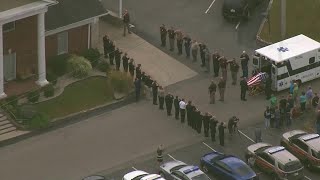 Aerials of procession for Meade County sheriff's deputy who died over weekend