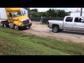 Chevy 1500 truck pulls out stuck 18 wheeler