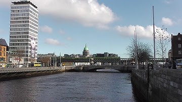 IE 8520 Class Dart Train crossing the River Liffey in Dublin, Ireland