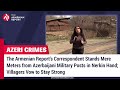 The armenian reports correspondent stands meters from azerbaijani military posts in nerkin hand