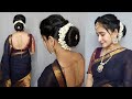 Diwali hairstyle 3 south indian koppu hairstyle with bun and jasmine flowers
