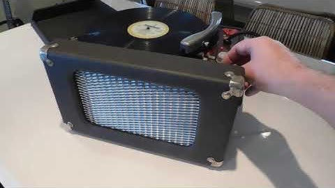 Newcomb record Player playing an LP record