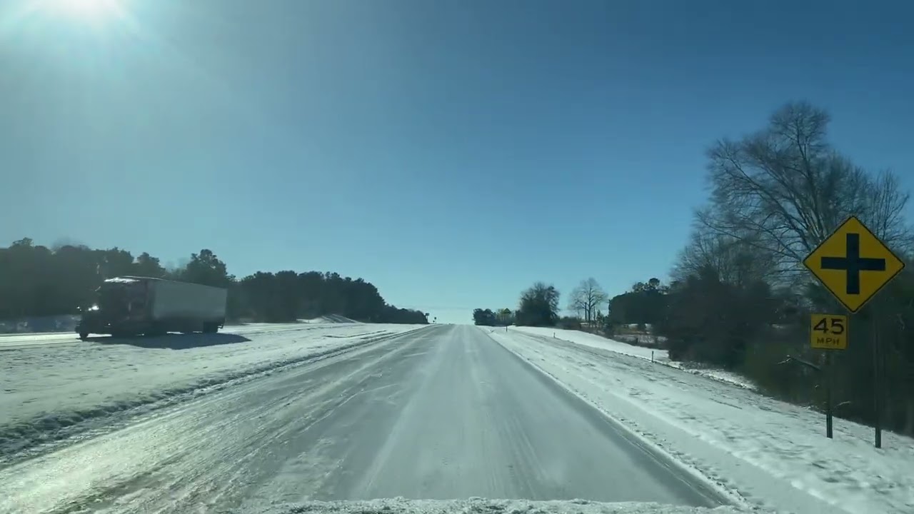 Day after historic snow in southern Alabama. Solid ice on the roads