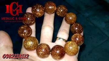 Vòng thạch anh tóc đỏ cam đồng ánh titan rực rỡ size to khủng 20ly