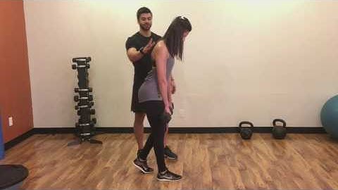 How To: Staggered-Stance Dumbbell Romanian Deadlift