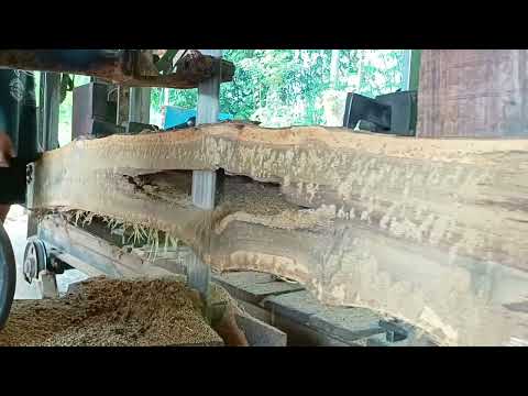 process of chopping old teak wood into 8×15 blocks - YouTube