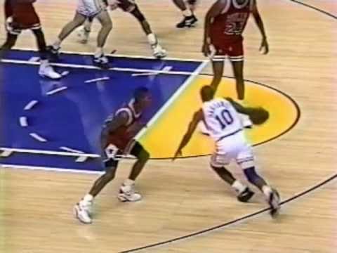 Tim Hardaway puts on his signature two-step on BJ Armstrong and then scores the and-1. November 24, 1992.
