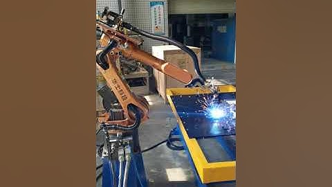 MIG welding robot with positioner