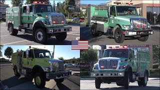 Multiple forest fire trucks responding, some with siren and lights,
general activity during a large wildfire in san bernadino, california,
united states ...