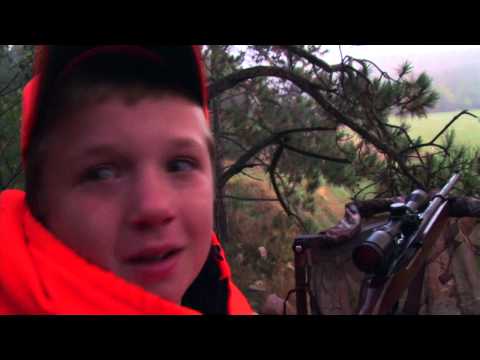 10 year old boy Shoots First Deer with Dad