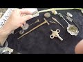 Old box of antique vintage watch jewelry parts. Looking for silver treasure. Good job for a cold day