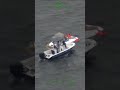 Father-son police officer duo rescues 6 people from sinking boat