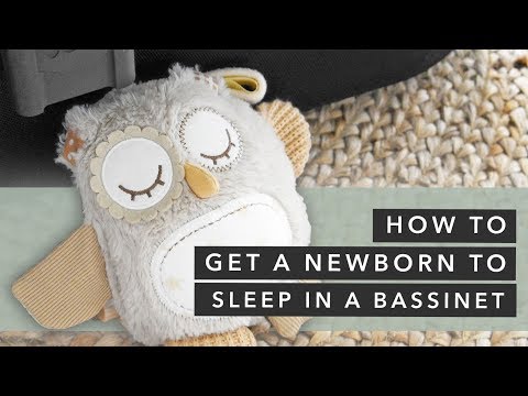 Come ottenere un neonato a dormire in una culla