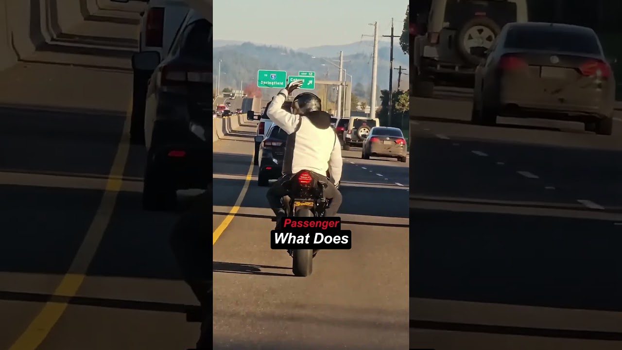 Driver can't understand biker's sign language
