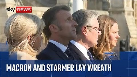 French President Emmanuel Macron lays a wreath at the statue of Sir Winston Churchill