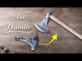 Crafting a wooden handle for an axe from tree wood