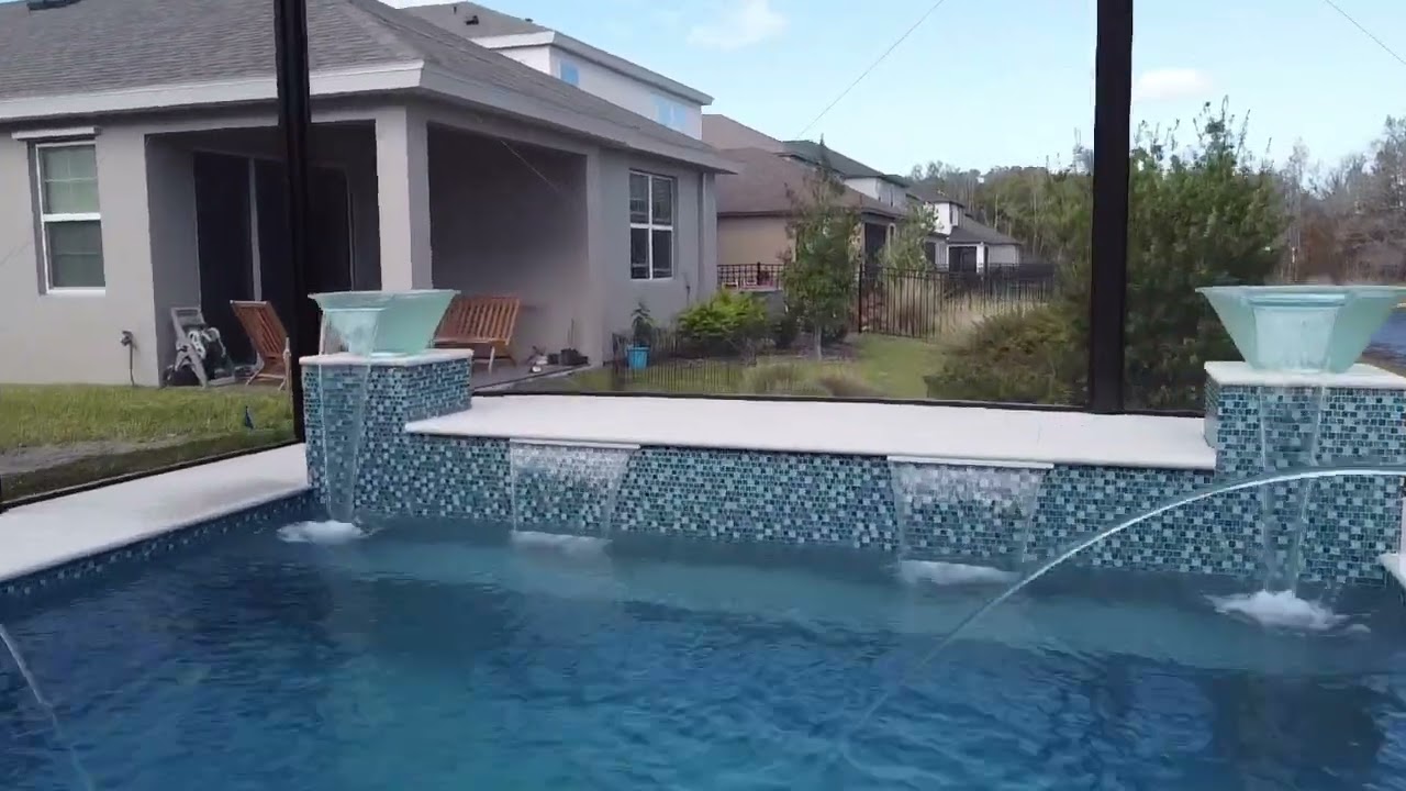 Swimming Pool & Spa with Screen Enclosure - Patio Pools (Drone Video)