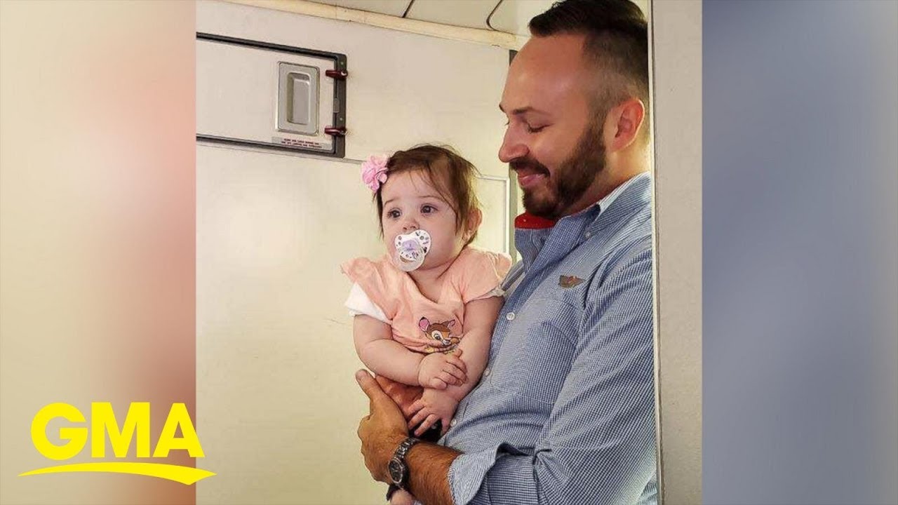Flight attendant calms down crying baby on her 1st flight | GMA