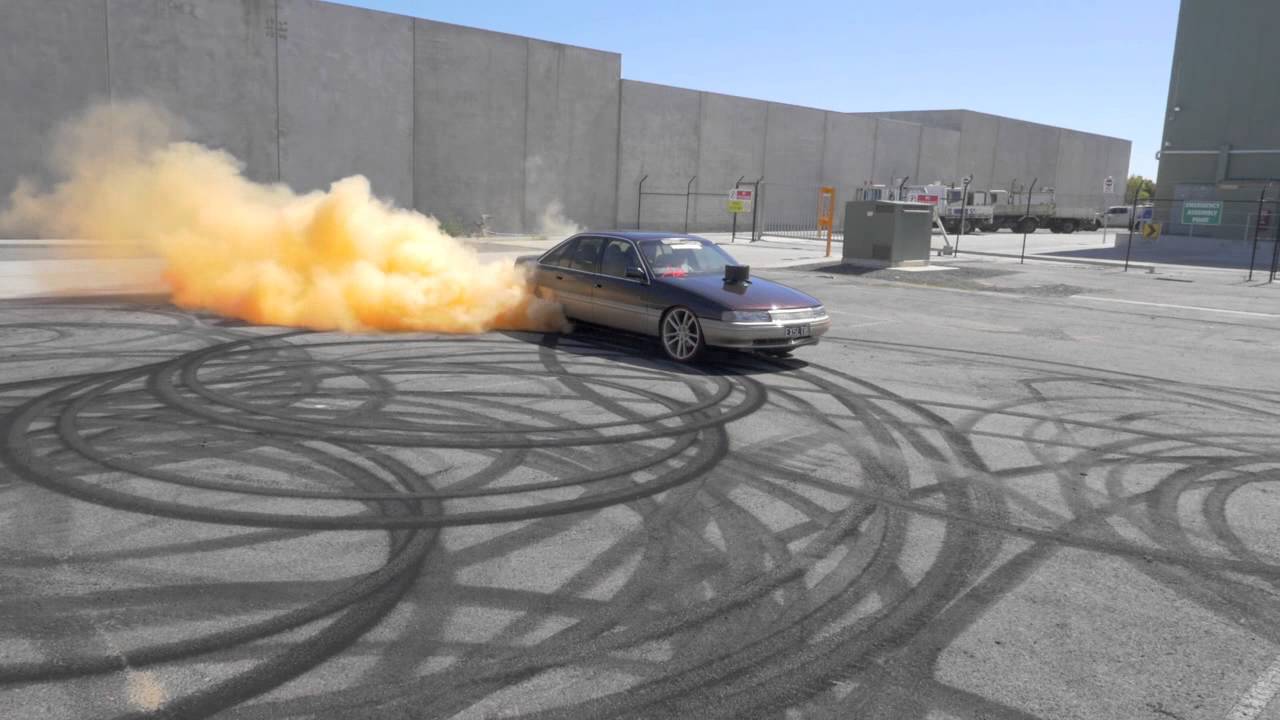 Close proximity Aerial Drone cinematography of Coloured Burnout