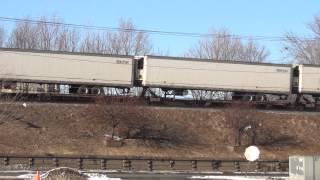 CSX Q017 Train Powers By on Raised Tracks