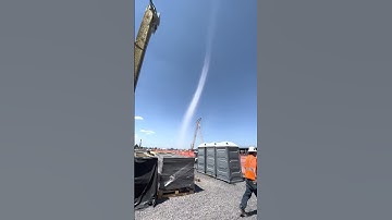 Tall Tornado Hits Close to Job Site || ViralHog