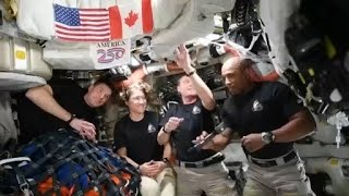 Artemis II crew flies around the Moon