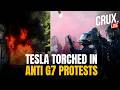 G7 Protests LIVE | Tesla Set on Fire, Police Fire Tear Gas in Geneva Clashes Ahead of France Summit