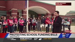 Teachers protesting school funding bills in Westfield