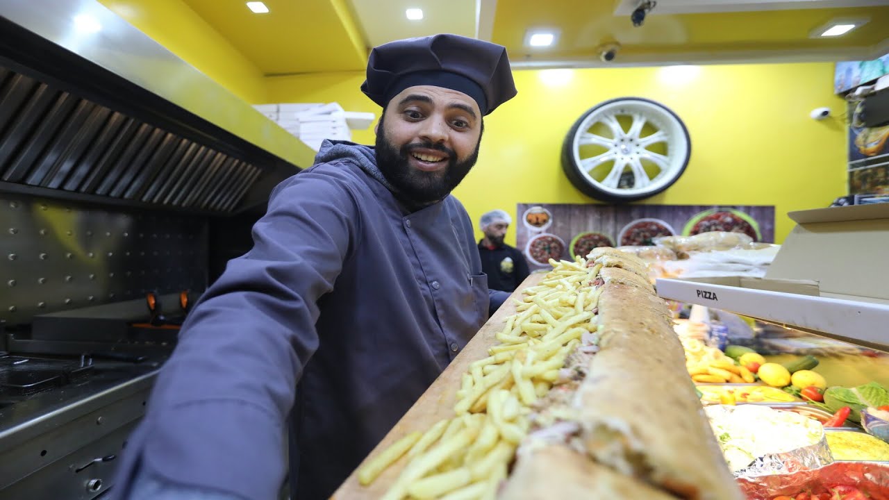 جرّبنا الخدمة عند تاكسي بيتزا وحضّرنالكم أكبر ساندويتش في تونس 😋🥖🇹🇳