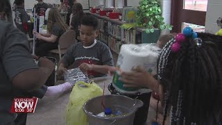 The Lima Kiwanis Club's K-Kids Club at Unity Elementary School helping people still recovering from