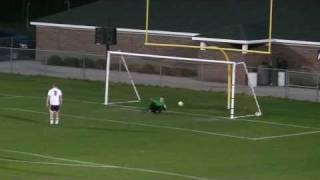 Eric puts in a long shot over the keeper.