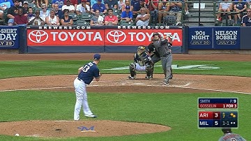 ARI@MIL: Fan uses her hat for catch, then dances