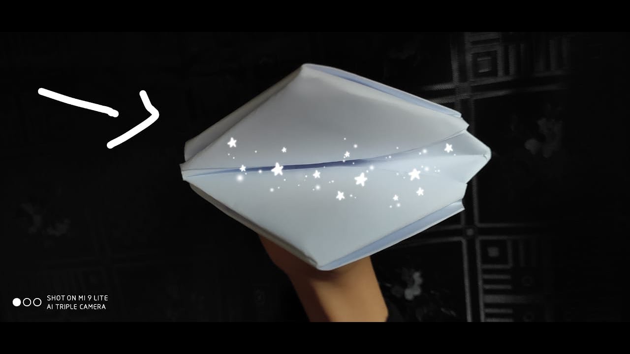 MAKING A PAPER DUCK MOUTH.