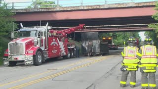 Dump truck hits bridge on Allens Creek Road in Brighton