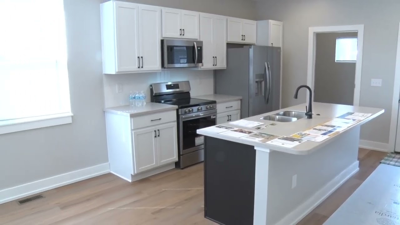 Ribbon Cutting for New Homes in the Wolf Creek Neighborhood